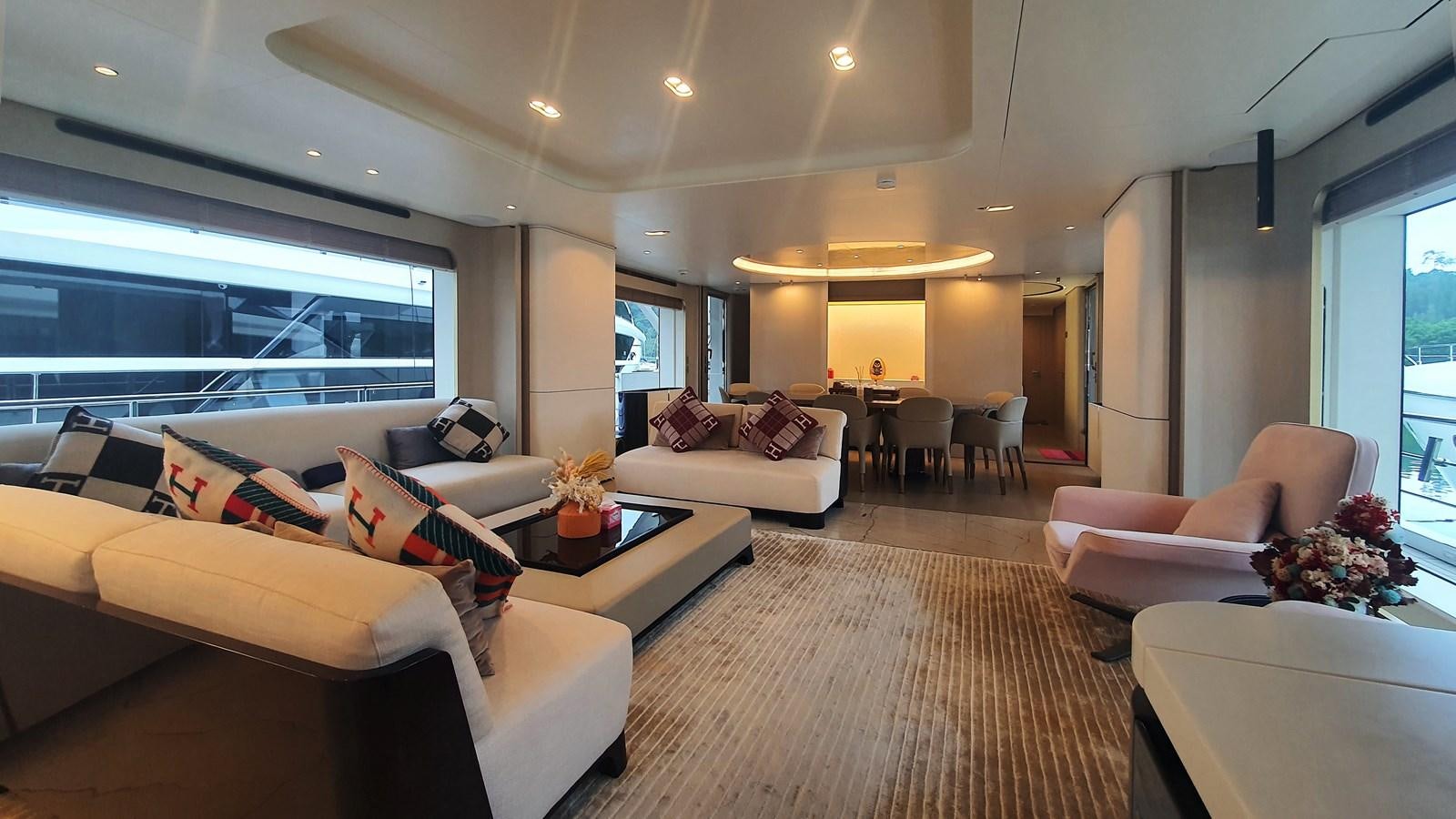 a living room with a large window aboard M32 025 Yacht for Sale