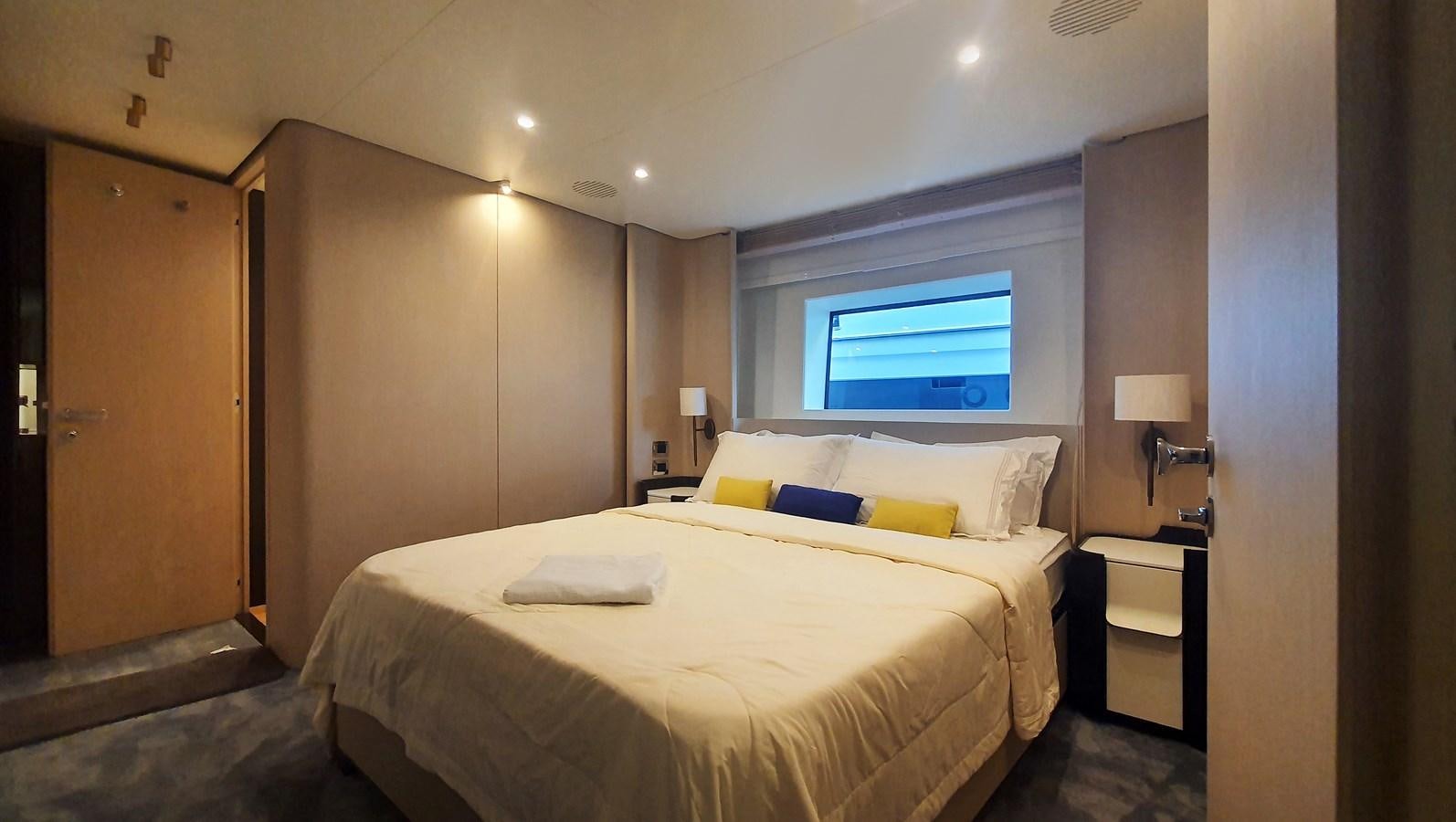 a hotel room with a bed aboard M32 025 Yacht for Sale