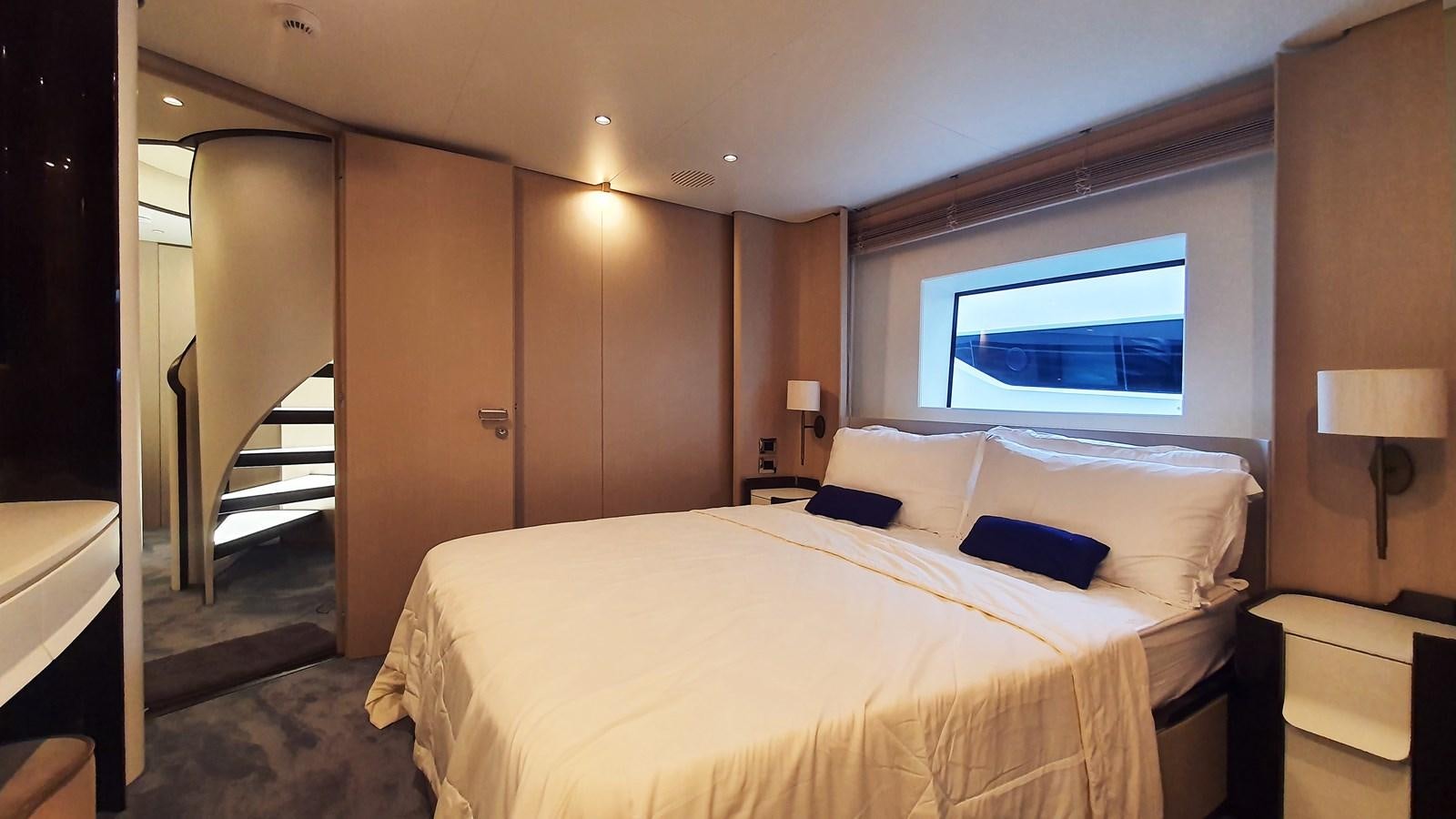 a hotel room with a bed aboard M32 025 Yacht for Sale