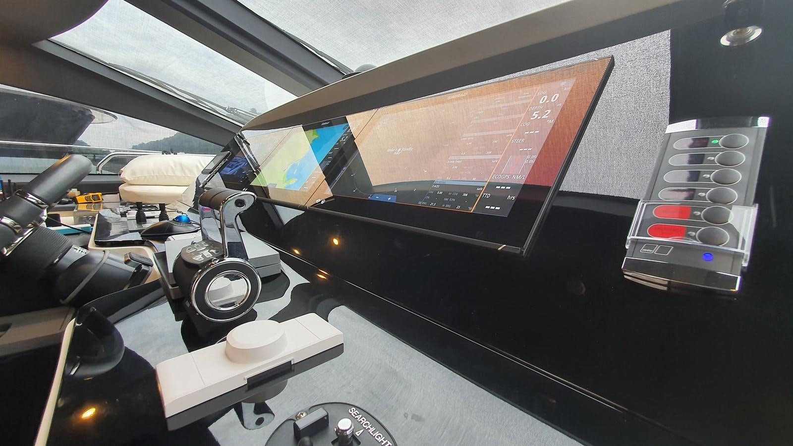 a computer with a screen and buttons aboard M32 025 Yacht for Sale
