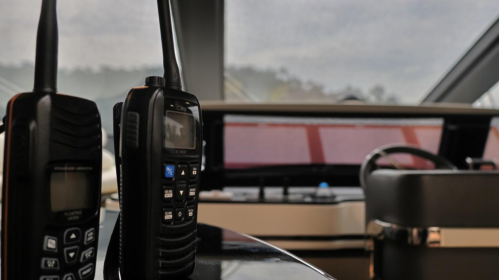 a phone on a dashboard aboard M32 025 Yacht for Sale