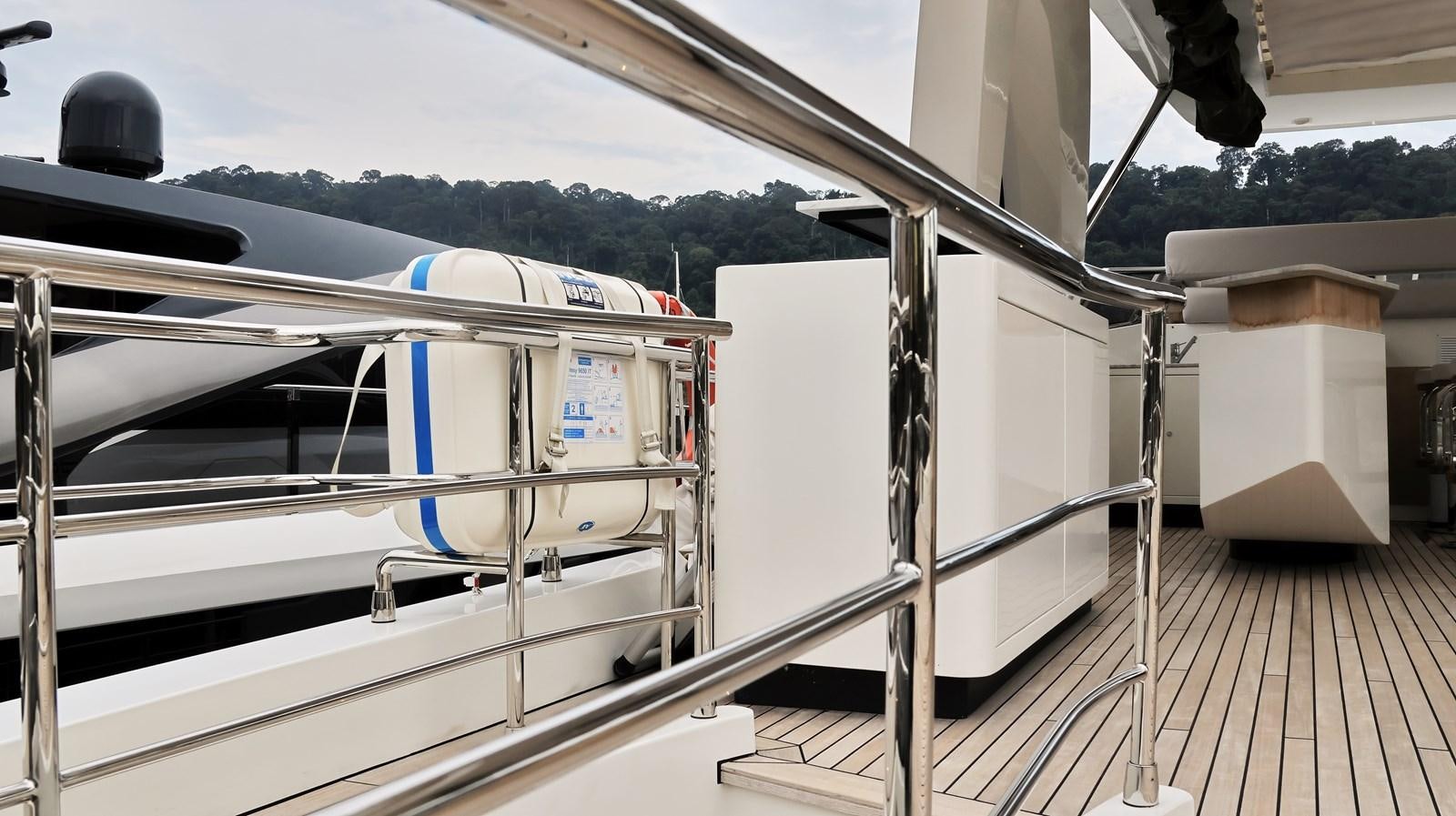 a white truck with a blue stripe aboard M32 025 Yacht for Sale