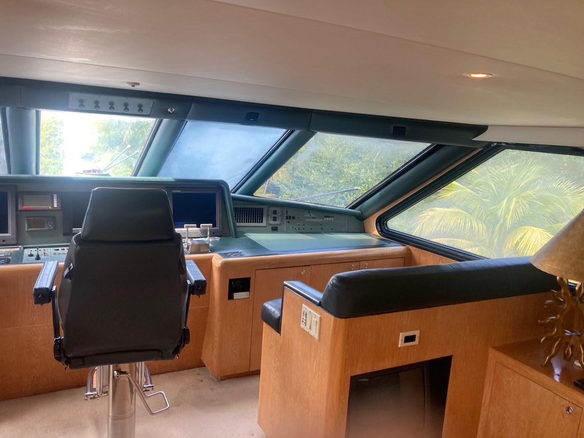 a room with a desk and chairs aboard LADY JANE Yacht for Sale