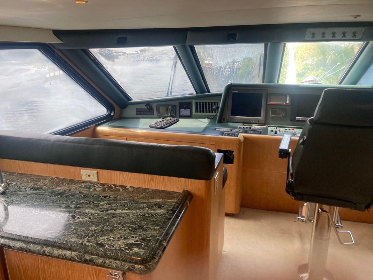 a vehicle with a desk and a computer on it aboard LADY JANE Yacht for Sale