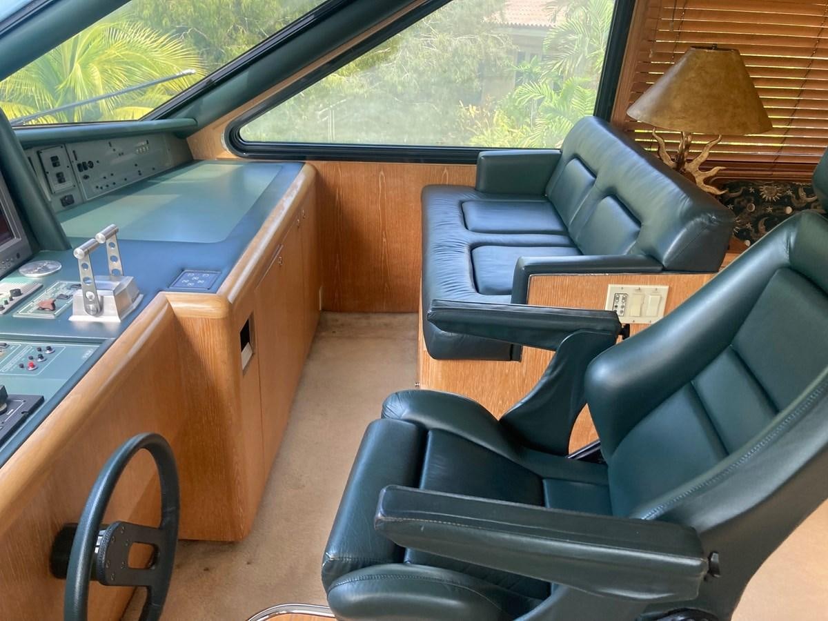 a vehicle with a desk and chairs aboard LADY JANE Yacht for Sale