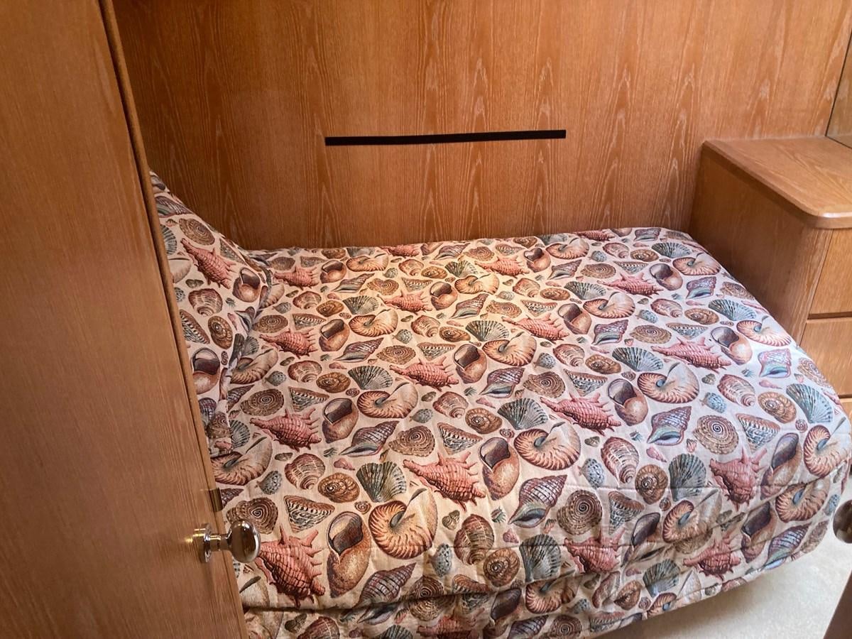 a pillow on a bed aboard LADY JANE Yacht for Sale