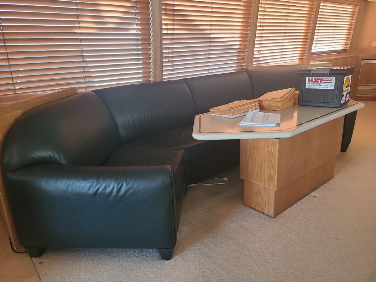 a couch and a coffee table aboard LADY JANE Yacht for Sale