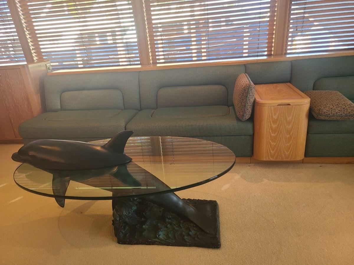a statue of a fish in a living room aboard LADY JANE Yacht for Sale