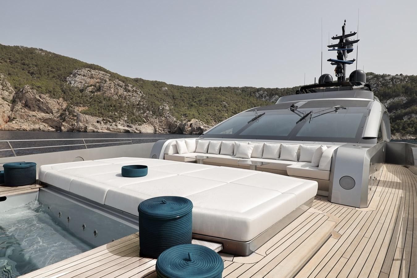 a white boat on a deck aboard NO STRESS Yacht for Sale