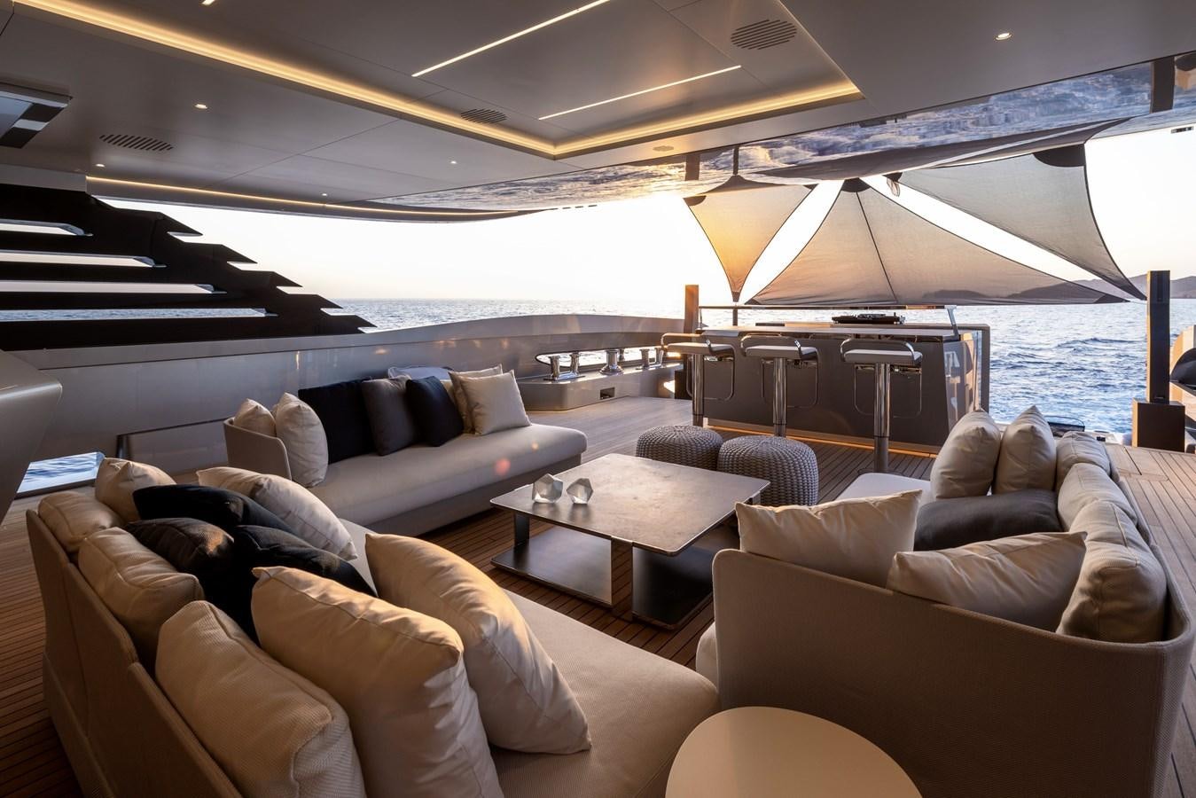 a large living room with a large body of water aboard NO STRESS Yacht for Sale