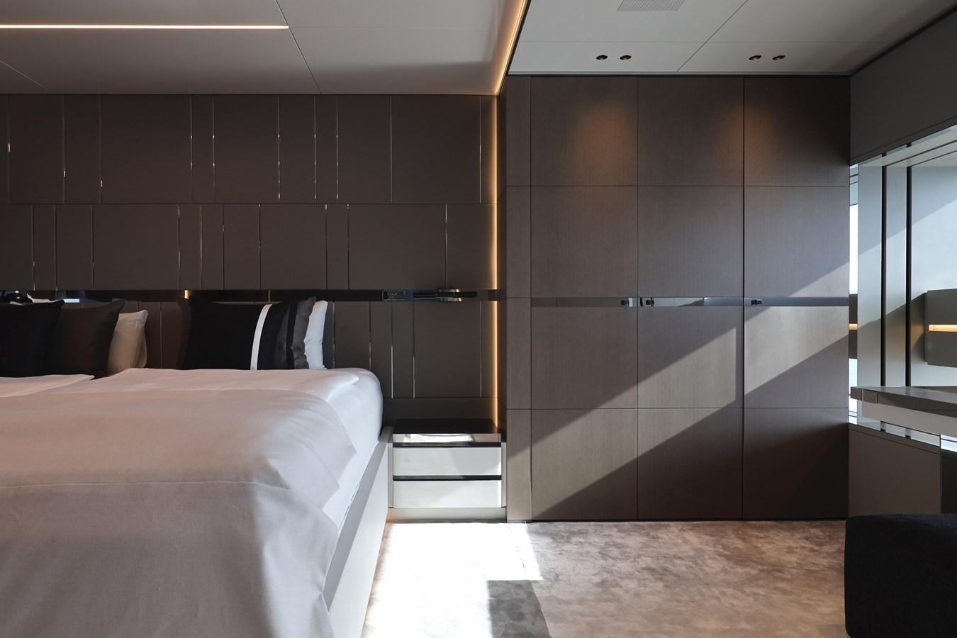 a room with a bed and a window aboard NO STRESS Yacht for Sale