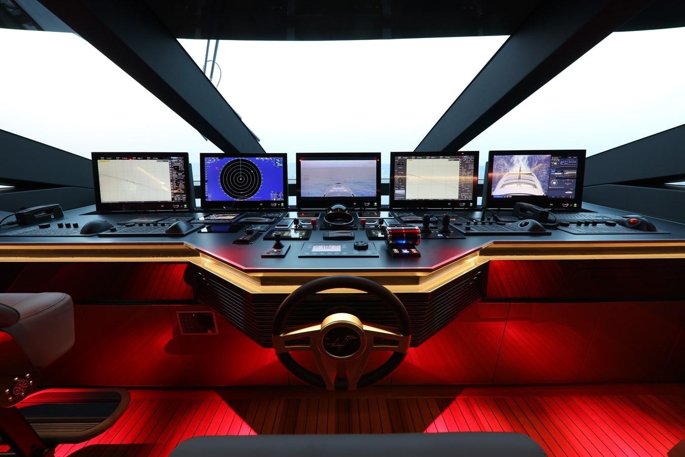 a row of computer screens on a desk aboard NO STRESS Yacht for Sale