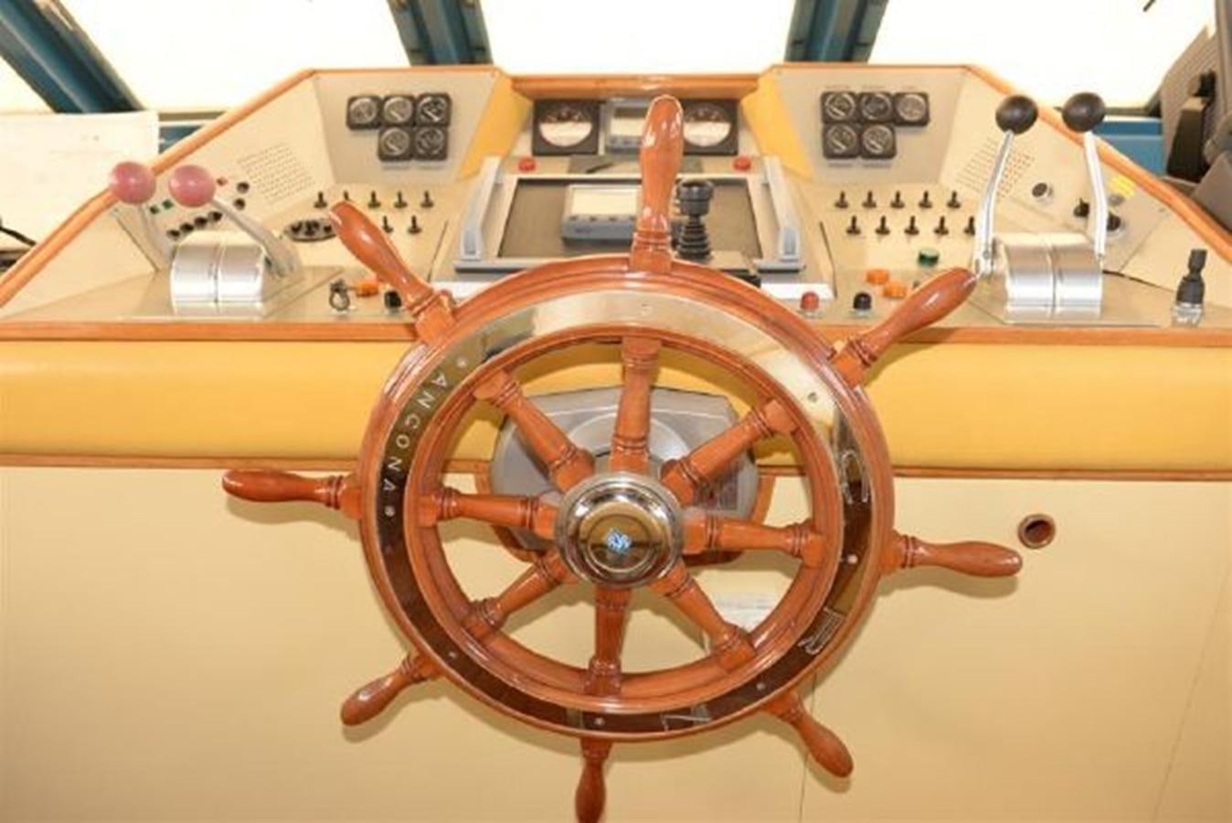 a yellow and orange machine aboard MISTER P Yacht for Sale