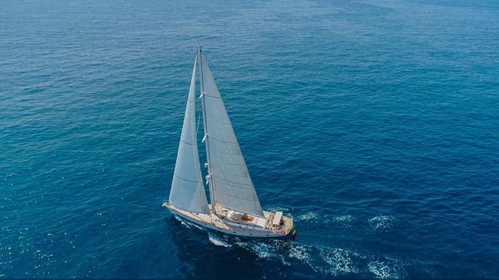 a sailboat on the water aboard WHITE DOLPHIN Yacht for Sale