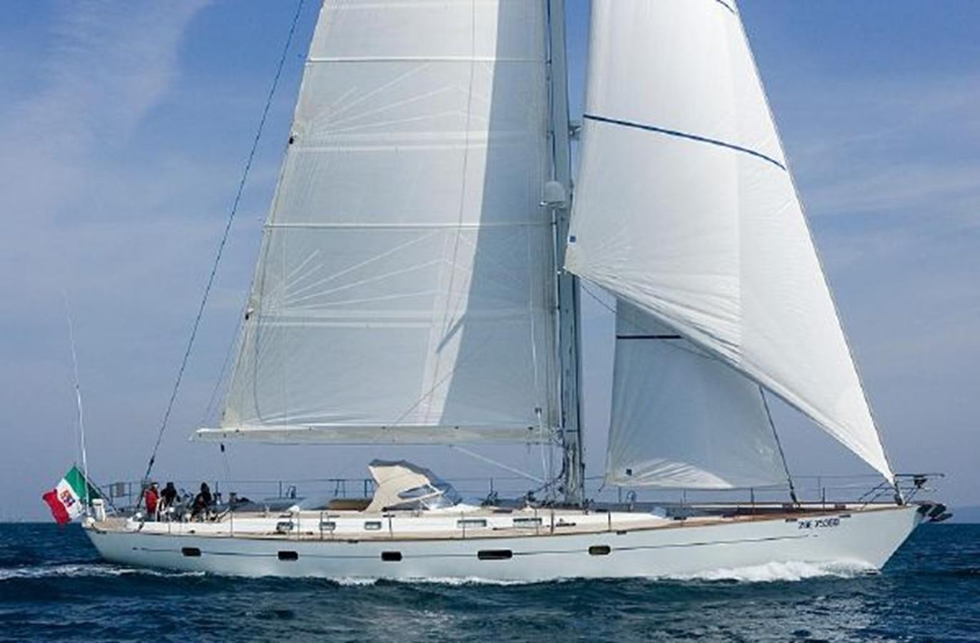 a sailboat on the water aboard WHITE DOLPHIN Yacht for Sale