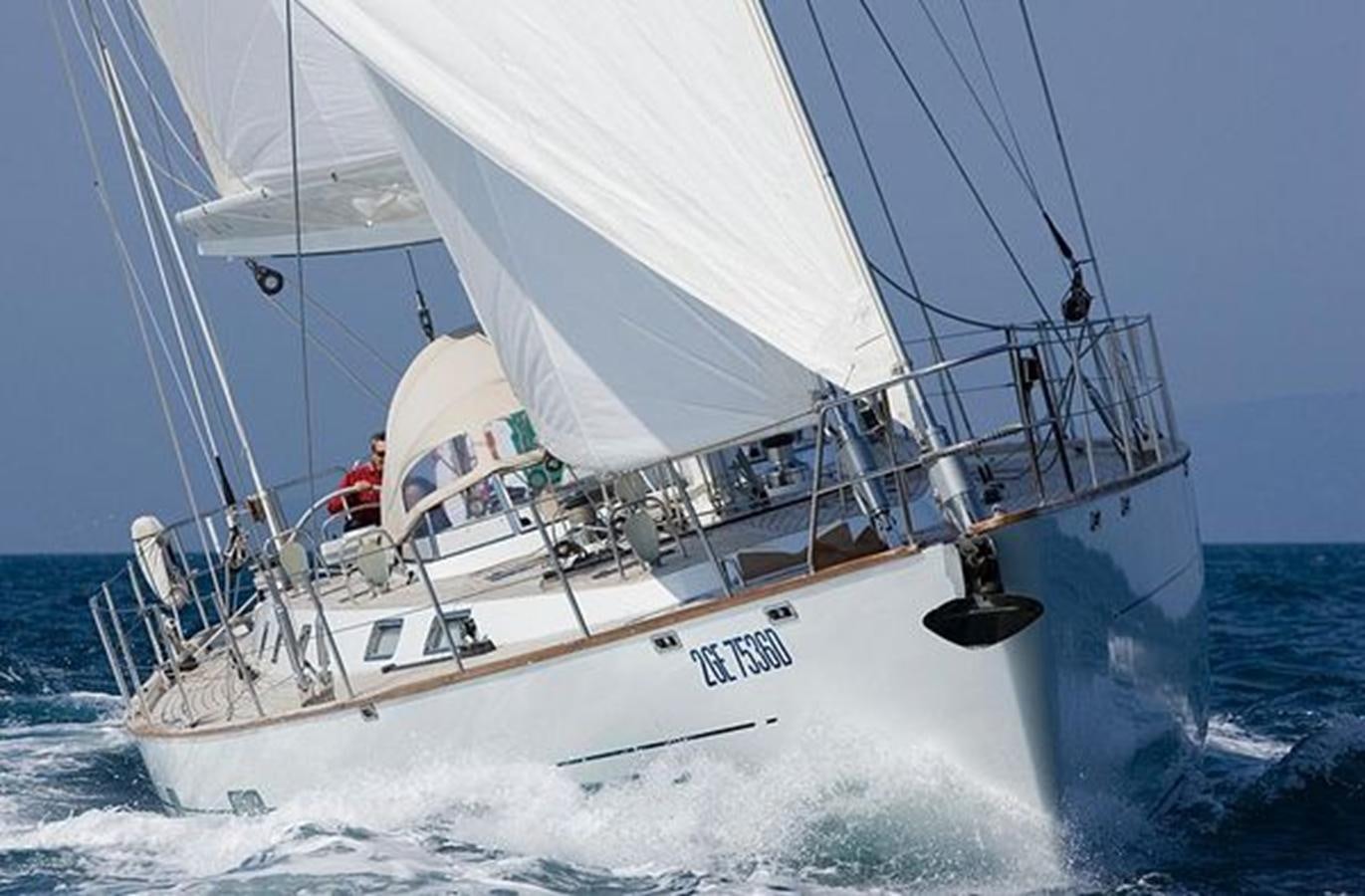 a sailboat on the water aboard WHITE DOLPHIN Yacht for Sale