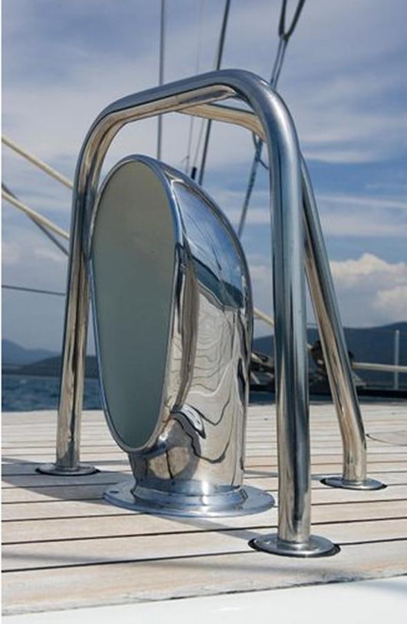 a pair of glasses on a table aboard WHITE DOLPHIN Yacht for Sale