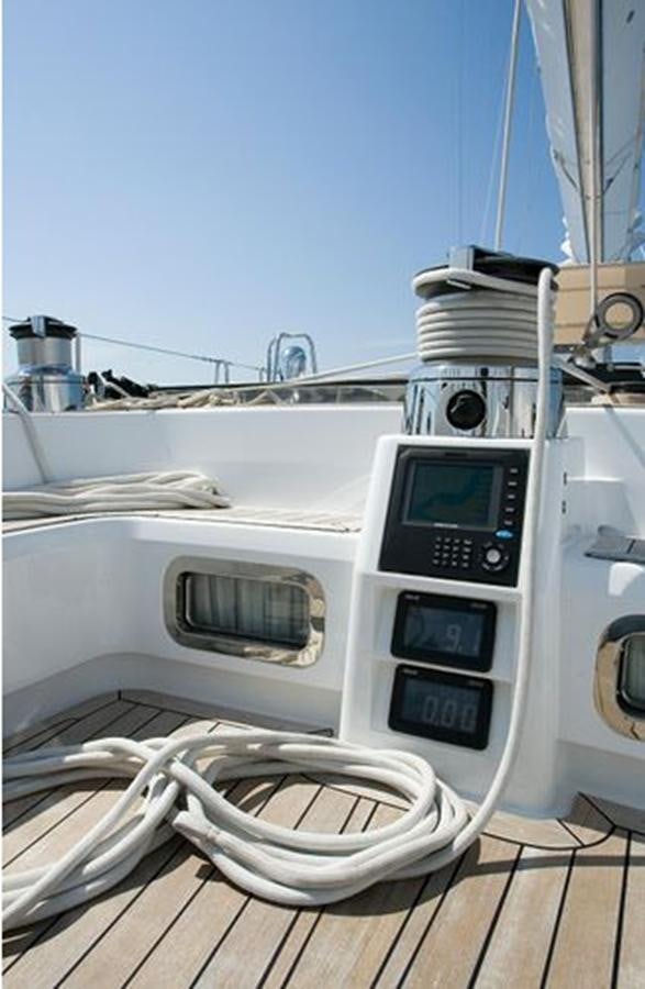 a white machine with a screen aboard WHITE DOLPHIN Yacht for Sale