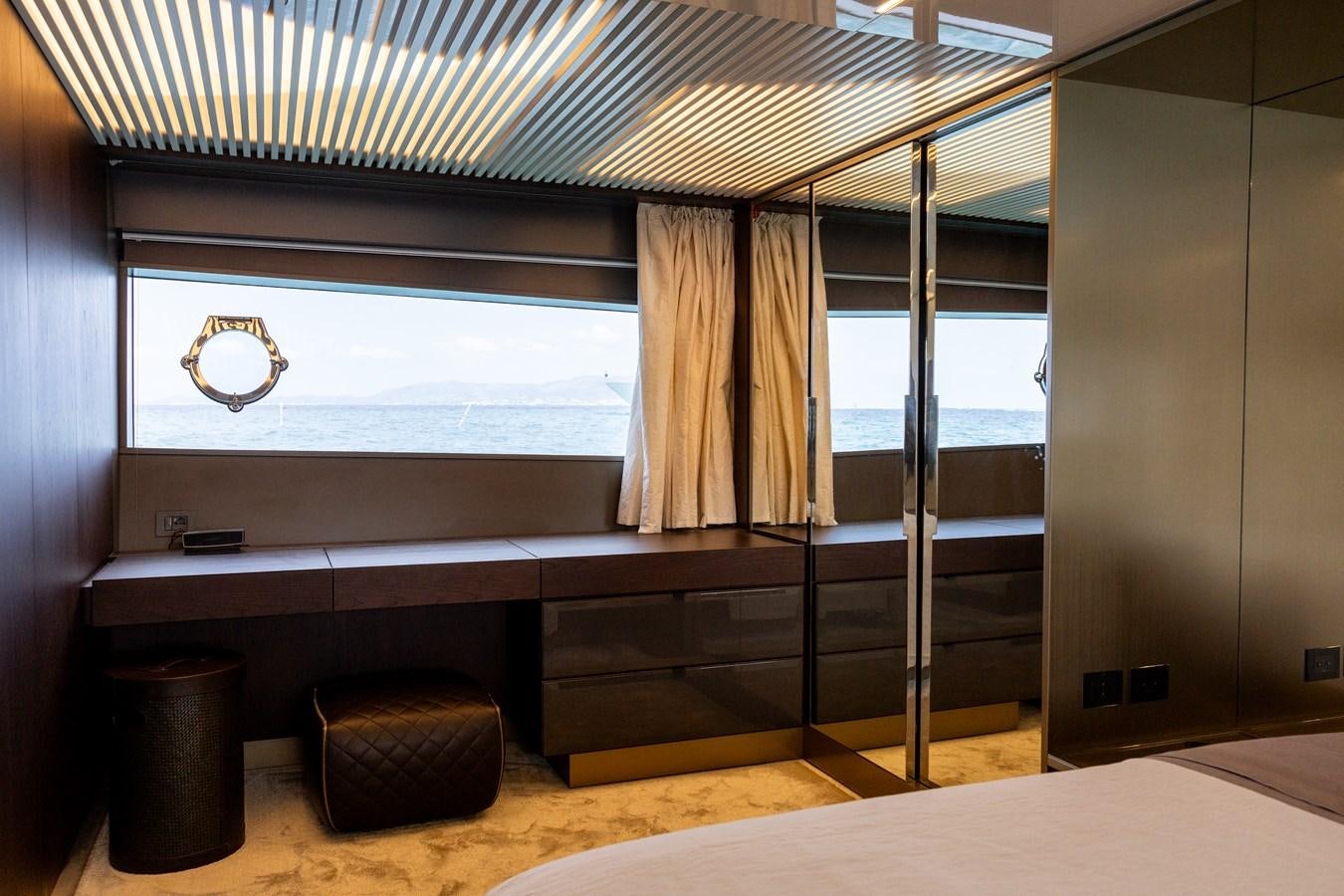 a room with a large window and a bench aboard LEWENSLUST Yacht for Sale