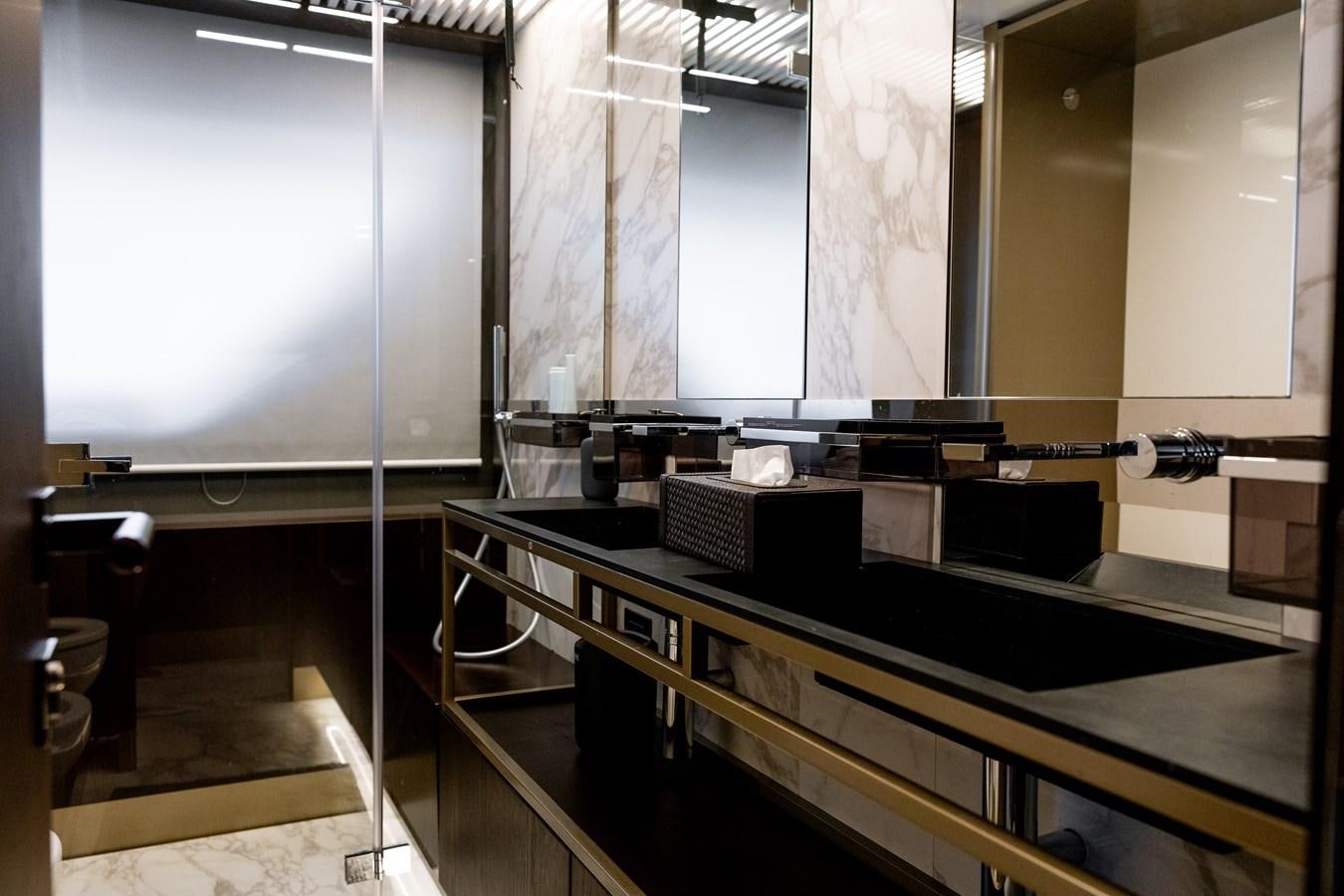 a room with a piano and a window aboard LEWENSLUST Yacht for Sale