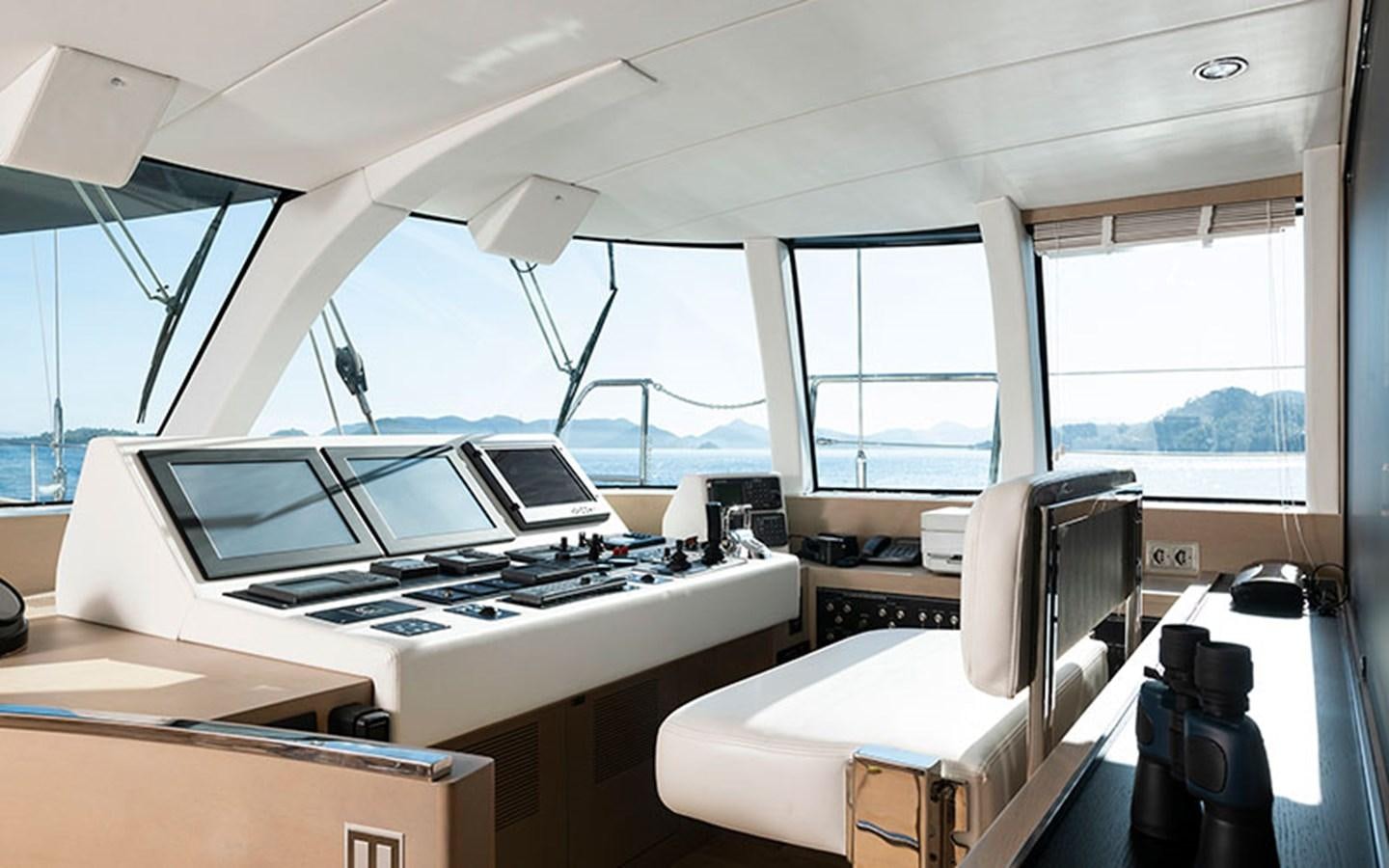 a room with a desk and computers aboard ATLANTIKA Yacht for Sale