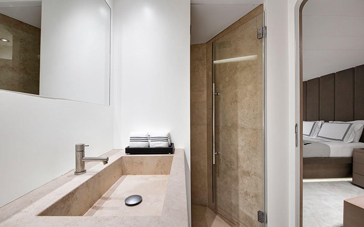 a bathroom with a sink and a shower aboard ATLANTIKA Yacht for Sale