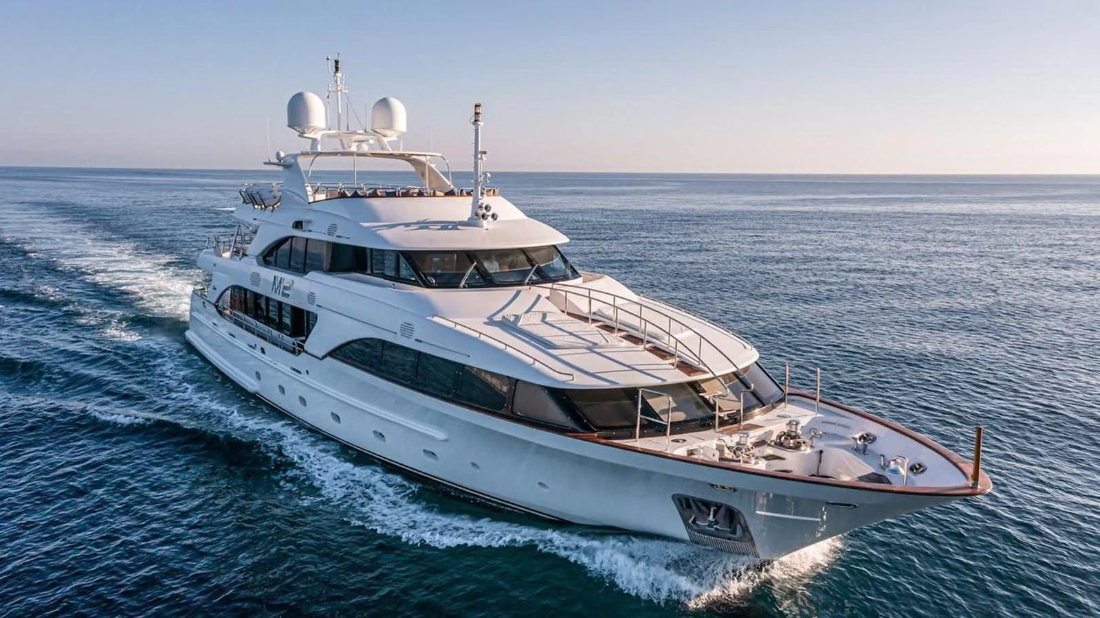 a white yacht on the water aboard ARTHUR’S WAY Yacht for Sale