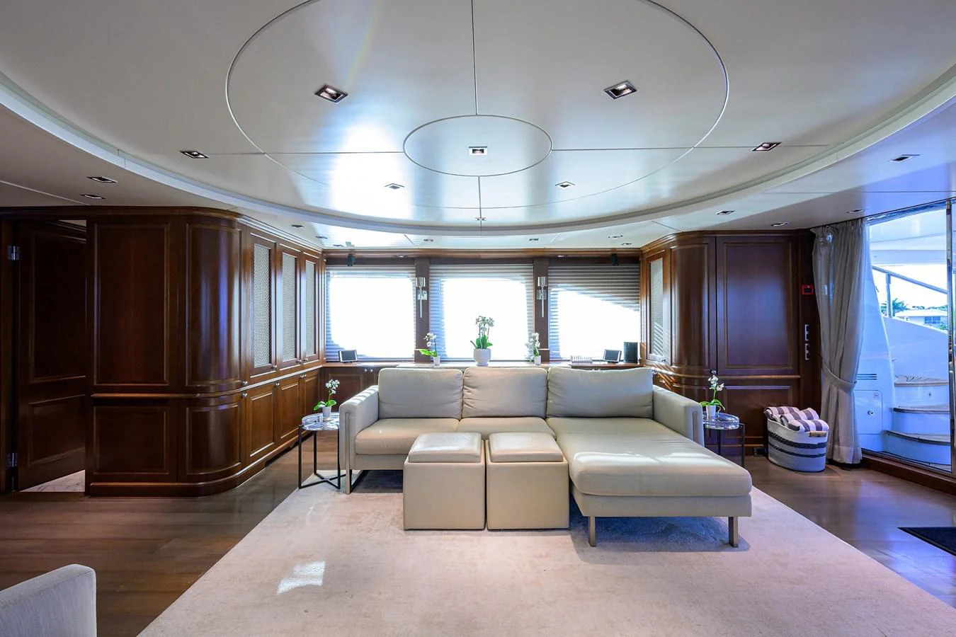a living room with a couch and a large window aboard ARTHUR’S WAY Yacht for Sale