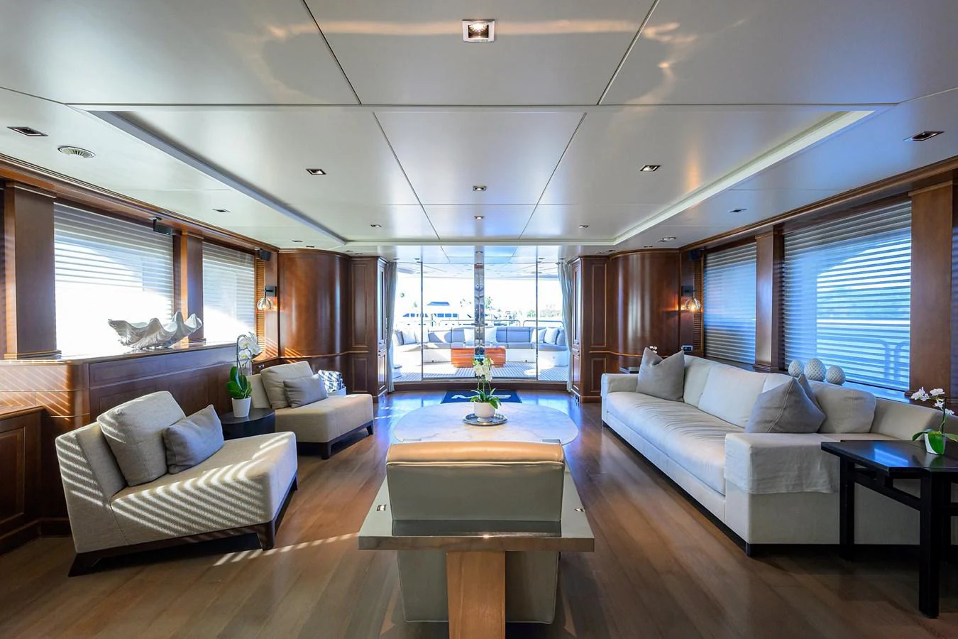 a living room with a large window aboard ARTHUR’S WAY Yacht for Sale