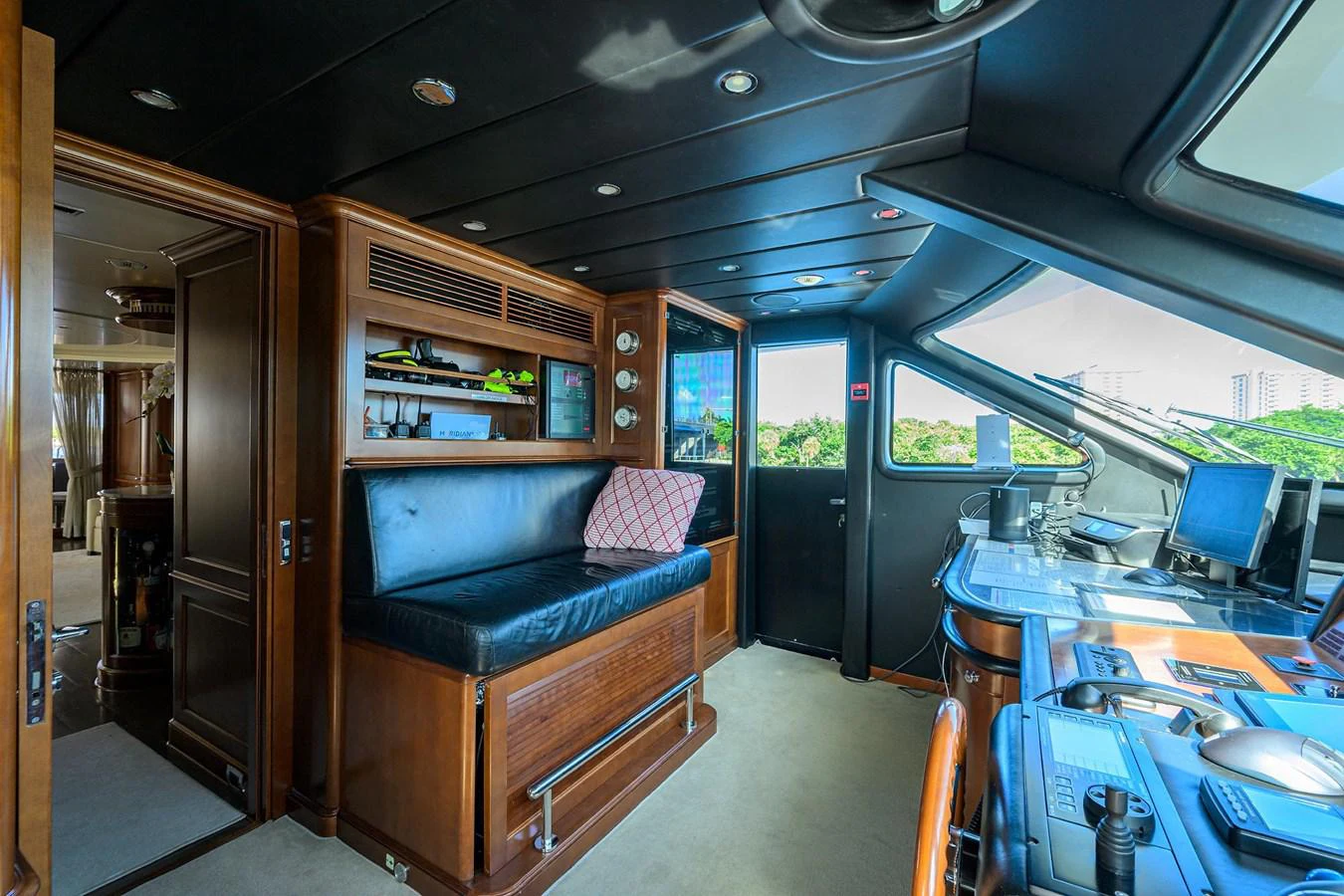 a room with a couch and a desk aboard ARTHUR’S WAY Yacht for Sale