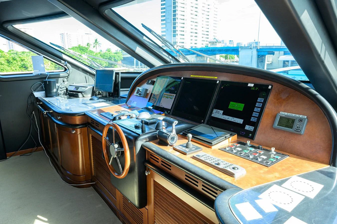 a car with a screen and a laptop on the dashboard aboard ARTHUR’S WAY Yacht for Sale