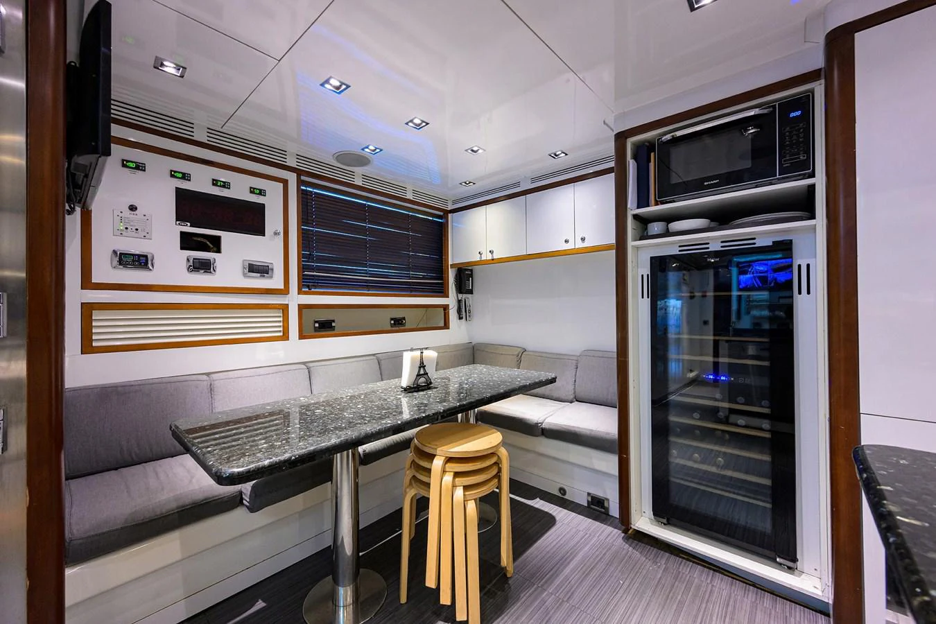 a room with a table and microwave aboard ARTHUR’S WAY Yacht for Sale