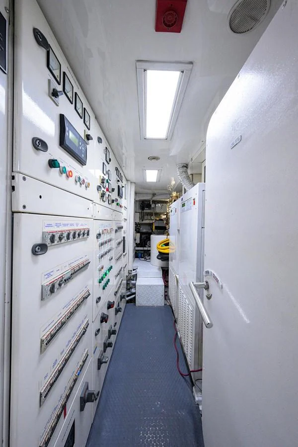 a hallway with white walls aboard ARTHUR’S WAY Yacht for Sale