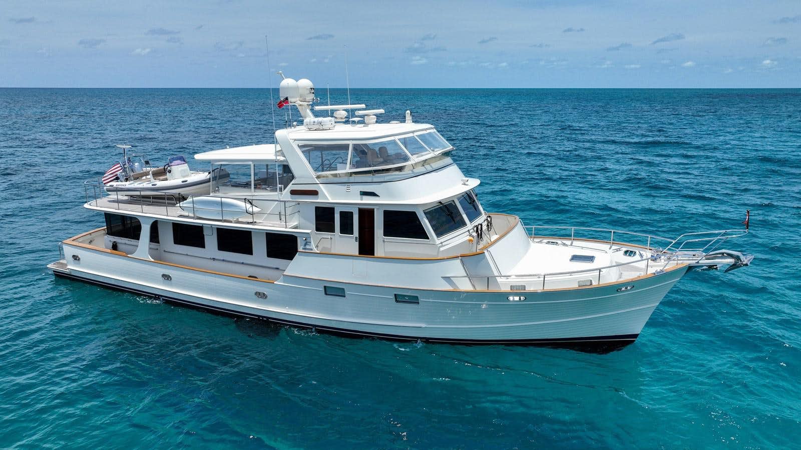 a white yacht in the ocean aboard FLEMING 78 - TRADITIONAL FLYBRIDGE Yacht for Sale