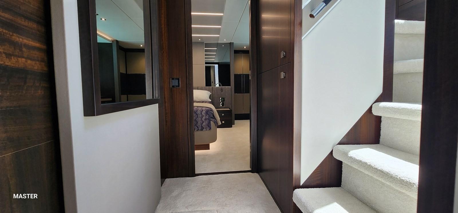 a room with a bed and a door aboard EL 5 MARES Yacht for Sale