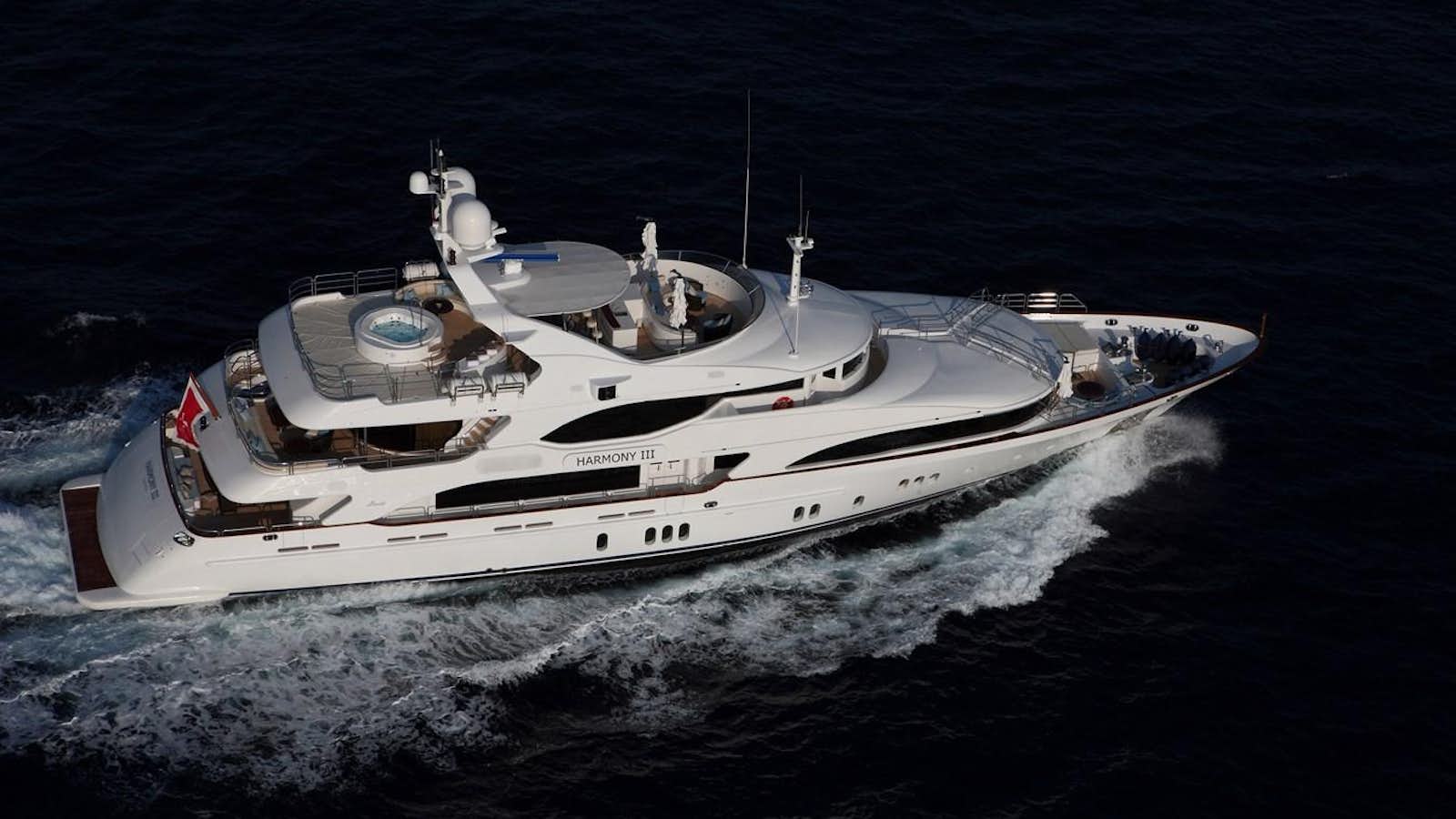 a boat on the water aboard HARMONY III Yacht for Sale