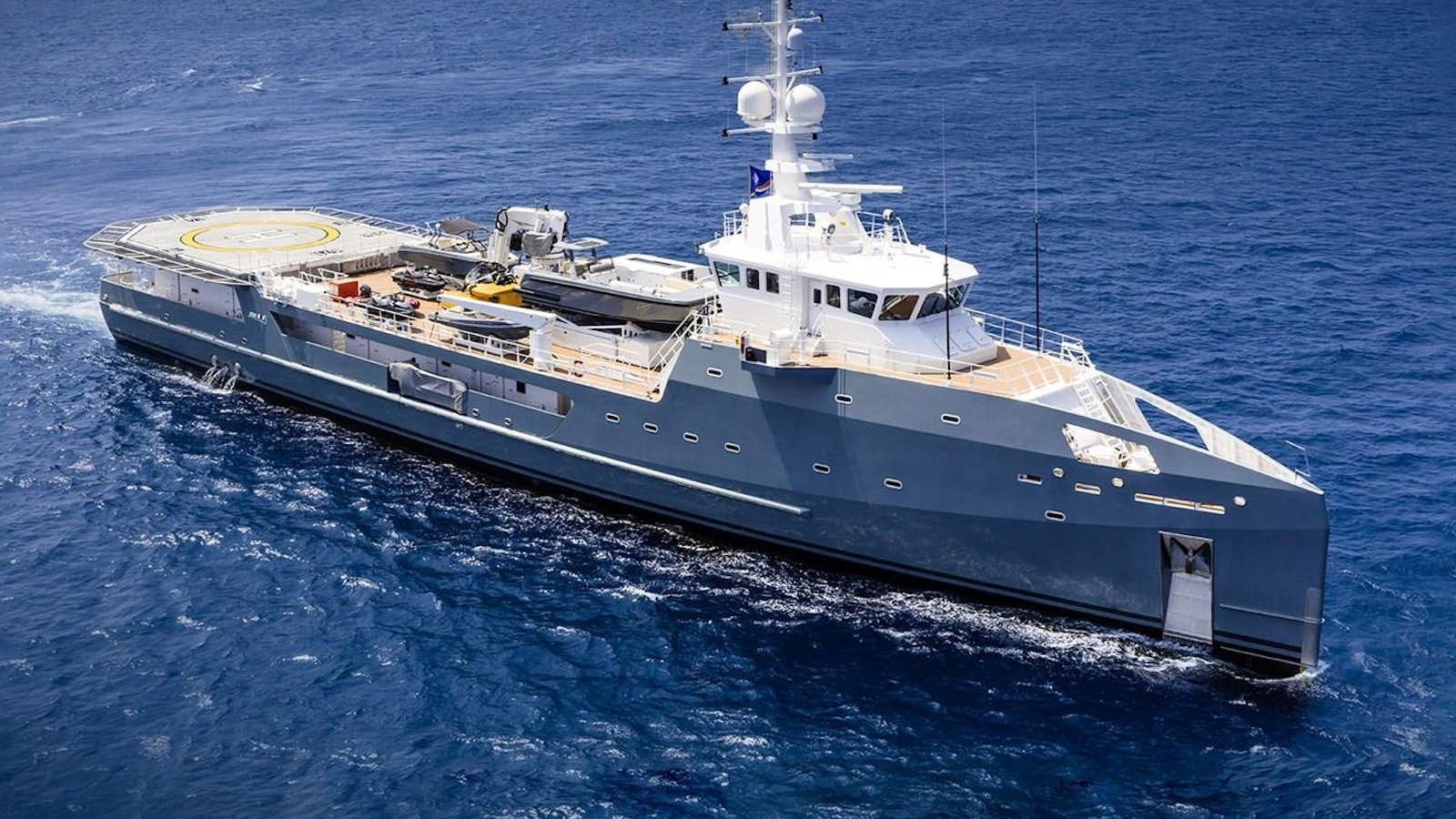 a large ship in the water aboard DAPPLE Yacht for Sale