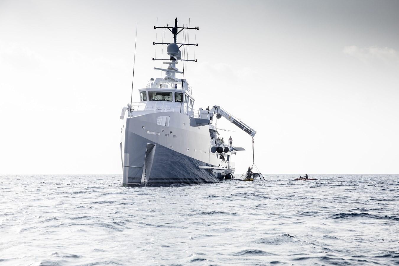 a large ship in the water aboard WINGMAN Yacht for Sale