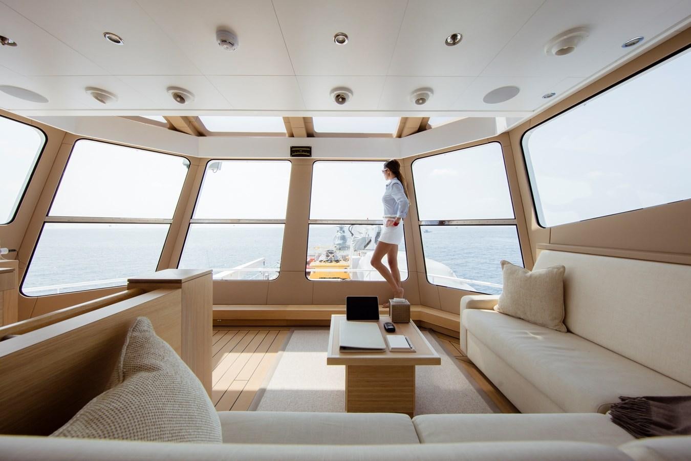 a person walking on a boat aboard WINGMAN Yacht for Sale