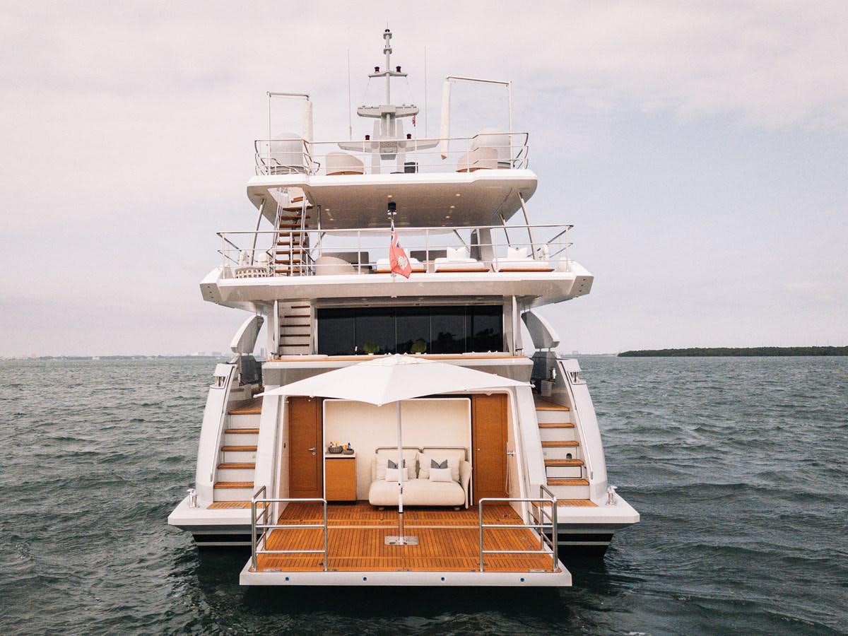 a large white boat in the water aboard AMICO Yacht for Sale