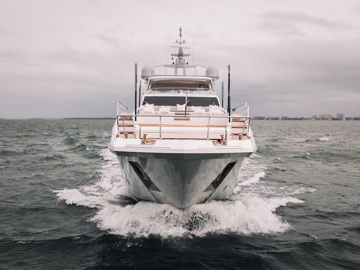 a large white boat in the water aboard AMICO Yacht for Sale