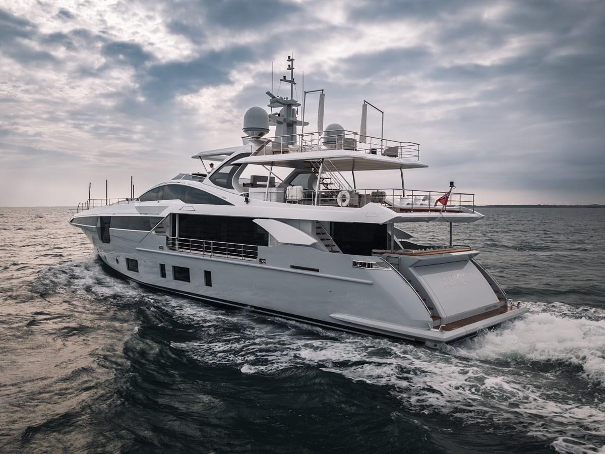 a white yacht on the water aboard AMICO Yacht for Sale