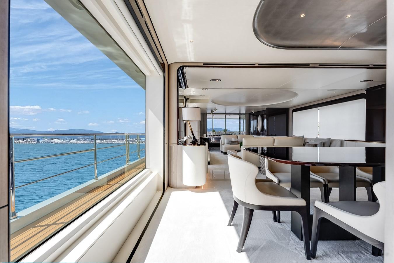a room with a view of the ocean and the ocean aboard AMICO Yacht for Sale