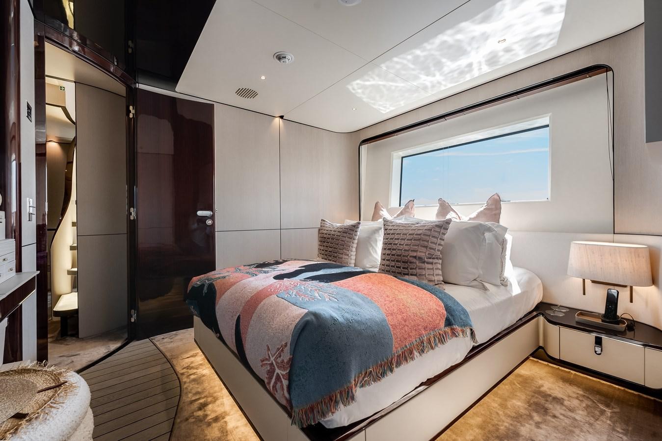 a bed in a room aboard AMICO Yacht for Sale
