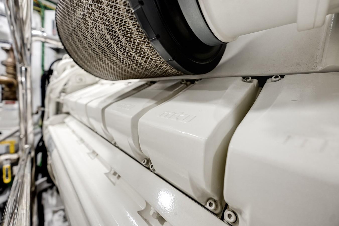 a white machine with a metal cap aboard AMICO Yacht for Sale