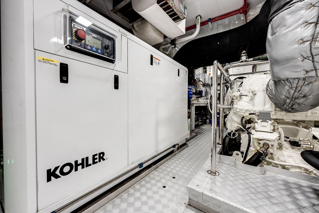 a machine in a room aboard AMICO Yacht for Sale