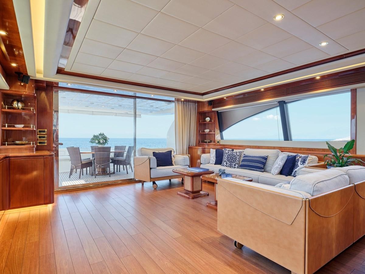 a living room with a large window aboard ESTIA YI Yacht for Sale