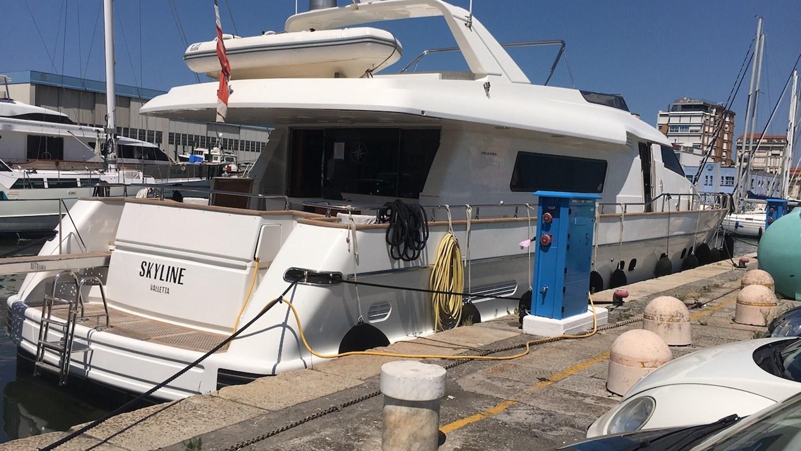 a boat is parked in a harbor aboard SKYLINE Yacht for Sale