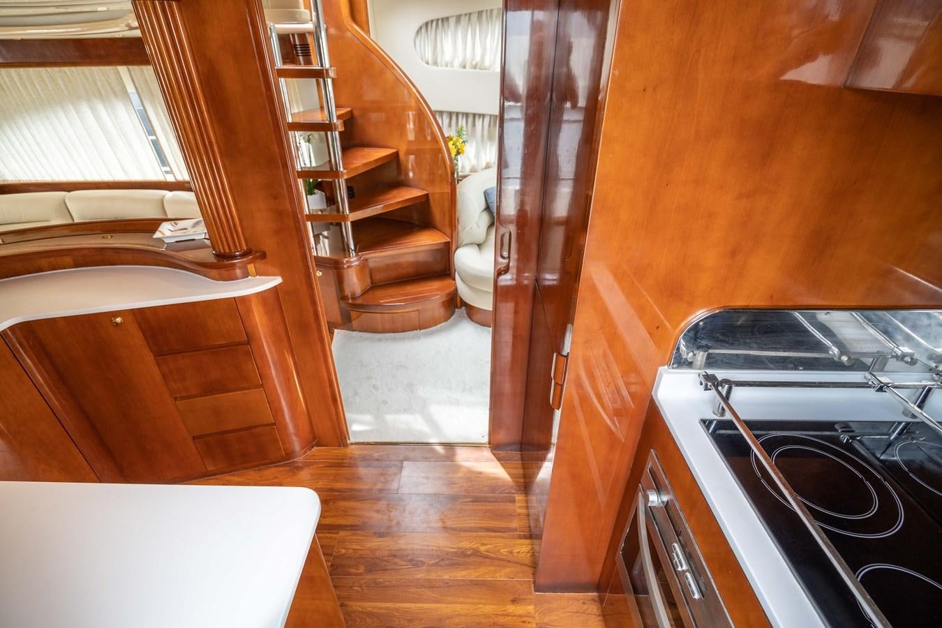 a kitchen with wooden floors aboard ESTIA ZEUS Yacht for Sale