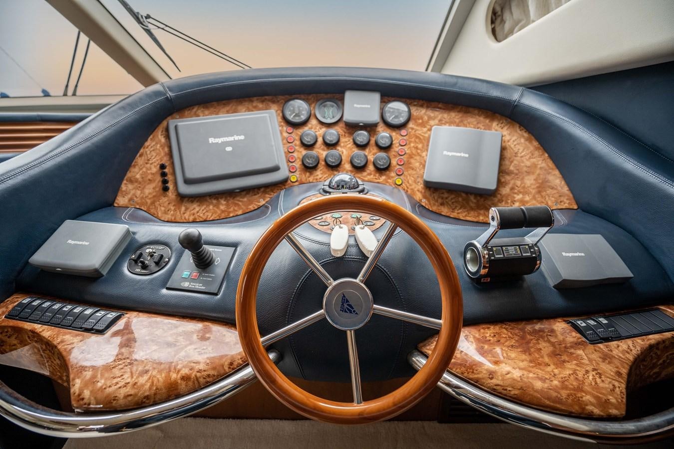 a brown car with a black radio aboard ESTIA ZEUS Yacht for Sale